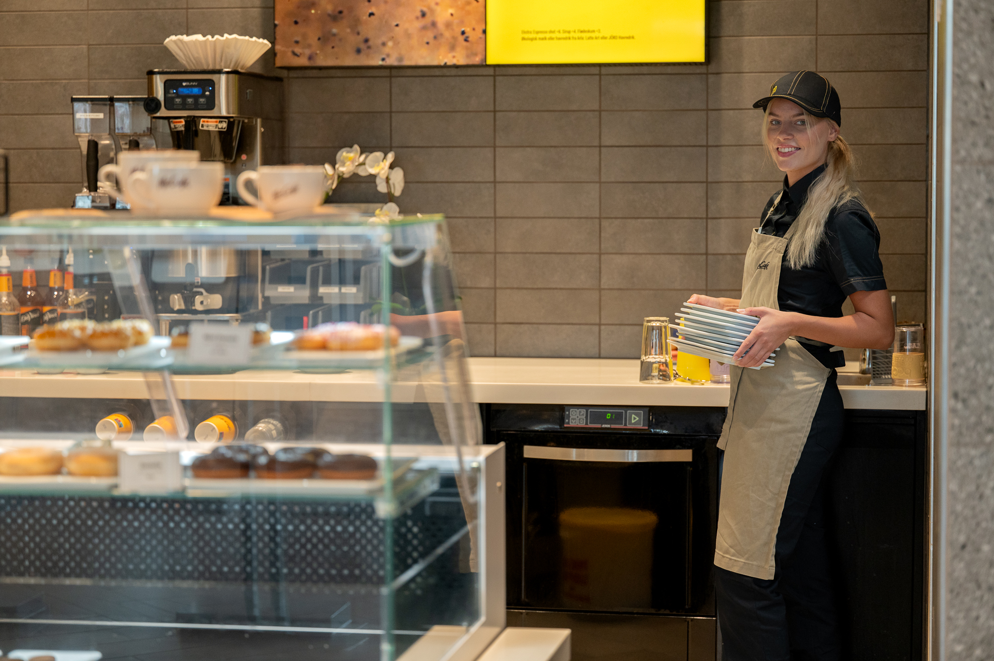 What can McDonald's clean in a hooded dishwasher and dish and warewasher?